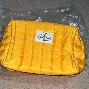 NIB large Sol De Janeiro hot yellow large cosmetic bag